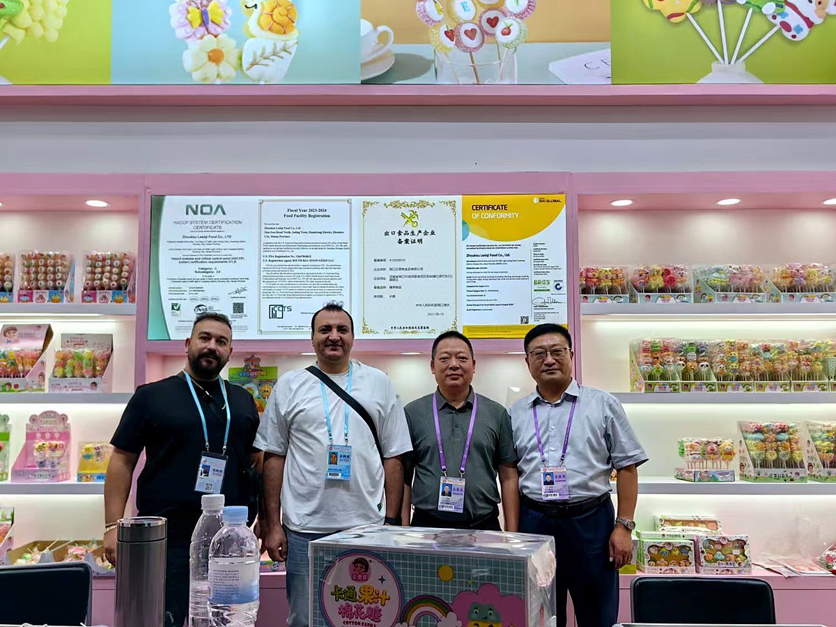 Buyers in front of our food-safety certification wall